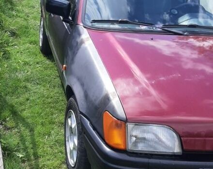 Красный Форд Фиеста, объемом двигателя 1.4 л и пробегом 200 тыс. км за 1100 $, фото 7 на Automoto.ua