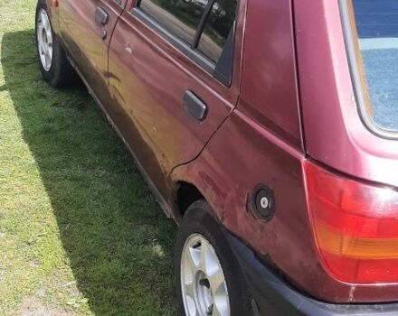 Красный Форд Фиеста, объемом двигателя 1.4 л и пробегом 200 тыс. км за 1100 $, фото 8 на Automoto.ua