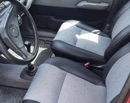 Красный Форд Фиеста, объемом двигателя 1.4 л и пробегом 200 тыс. км за 1100 $, фото 5 на Automoto.ua