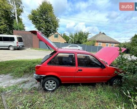 Красный Форд Фиеста, объемом двигателя 1.1 л и пробегом 210 тыс. км за 750 $, фото 2 на Automoto.ua