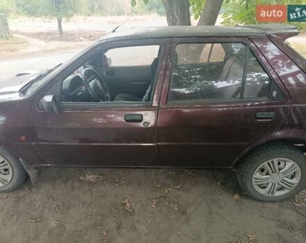 Красный Форд Фиеста, объемом двигателя 1.8 л и пробегом 190 тыс. км за 1066 $, фото 6 на Automoto.ua