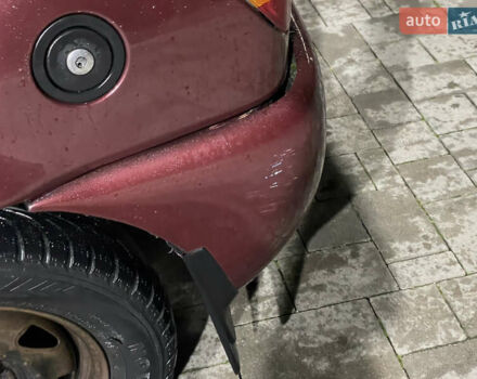 Красный Форд Фиеста, объемом двигателя 1.1 л и пробегом 300 тыс. км за 1100 $, фото 7 на Automoto.ua