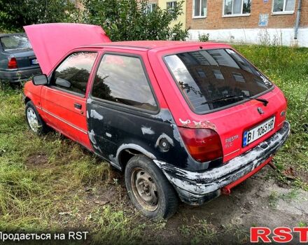 Червоний Форд Фієста, об'ємом двигуна 1.1 л та пробігом 210 тис. км за 750 $, фото 9 на Automoto.ua