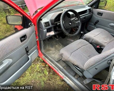 Червоний Форд Фієста, об'ємом двигуна 1.1 л та пробігом 210 тис. км за 750 $, фото 8 на Automoto.ua