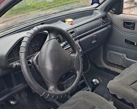 Красный Форд Фиеста, объемом двигателя 1.12 л и пробегом 100 тыс. км за 1066 $, фото 5 на Automoto.ua