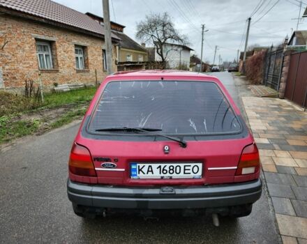 Красный Форд Фиеста, объемом двигателя 1.1 л и пробегом 345 тыс. км за 650 $, фото 4 на Automoto.ua