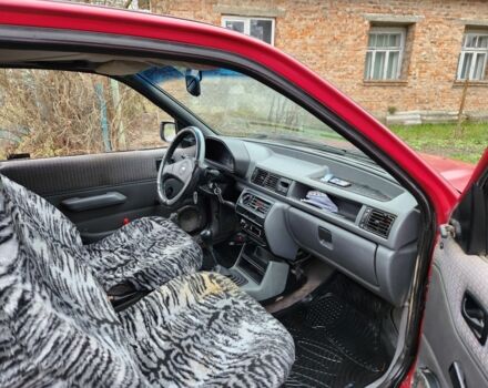 Красный Форд Фиеста, объемом двигателя 1.1 л и пробегом 345 тыс. км за 650 $, фото 8 на Automoto.ua