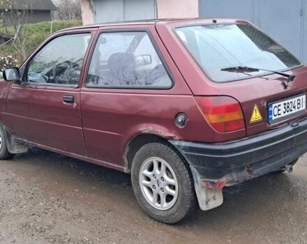 Красный Форд Фиеста, объемом двигателя 1.1 л и пробегом 100 тыс. км за 1070 $, фото 3 на Automoto.ua