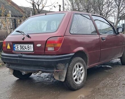 Красный Форд Фиеста, объемом двигателя 1.1 л и пробегом 100 тыс. км за 1070 $, фото 4 на Automoto.ua