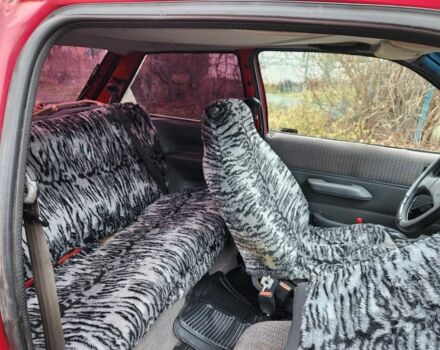 Красный Форд Фиеста, объемом двигателя 1.1 л и пробегом 345 тыс. км за 650 $, фото 9 на Automoto.ua