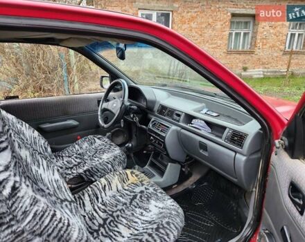 Красный Форд Фиеста, объемом двигателя 1.1 л и пробегом 358 тыс. км за 650 $, фото 6 на Automoto.ua