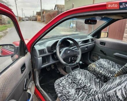 Красный Форд Фиеста, объемом двигателя 1.1 л и пробегом 358 тыс. км за 650 $, фото 7 на Automoto.ua