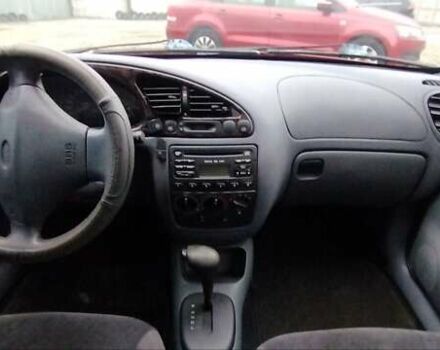 Красный Форд Фиеста, объемом двигателя 1.25 л и пробегом 260 тыс. км за 1550 $, фото 16 на Automoto.ua