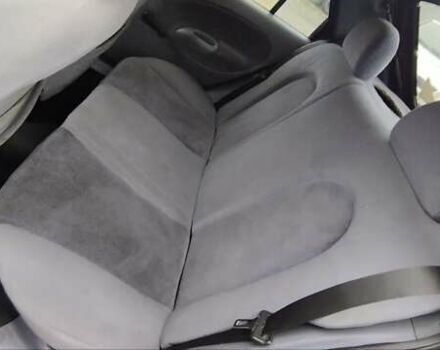 Красный Форд Фиеста, объемом двигателя 1.25 л и пробегом 260 тыс. км за 1550 $, фото 10 на Automoto.ua