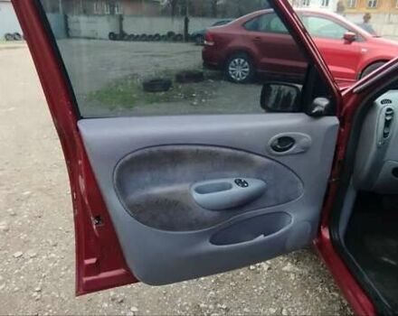 Красный Форд Фиеста, объемом двигателя 1.25 л и пробегом 260 тыс. км за 1550 $, фото 8 на Automoto.ua