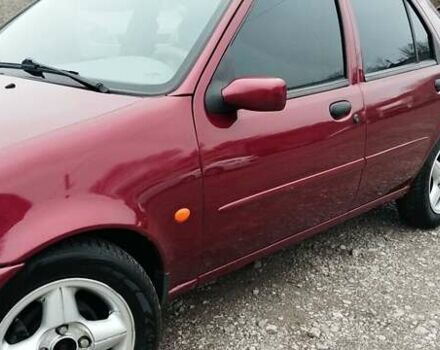 Красный Форд Фиеста, объемом двигателя 1.25 л и пробегом 260 тыс. км за 1550 $, фото 2 на Automoto.ua