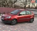 Красный Форд Фиеста, объемом двигателя 1.4 л и пробегом 160 тыс. км за 2950 $, фото 1 на Automoto.ua