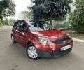 Красный Форд Фиеста, объемом двигателя 1.4 л и пробегом 309 тыс. км за 2690 $, фото 1 на Automoto.ua