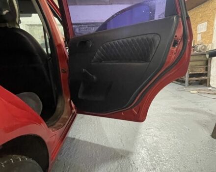 Червоний Форд Фієста, об'ємом двигуна 1.4 л та пробігом 214 тис. км за 3500 $, фото 10 на Automoto.ua