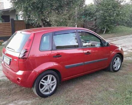 Красный Форд Фиеста, объемом двигателя 1.4 л и пробегом 306 тыс. км за 4100 $, фото 1 на Automoto.ua