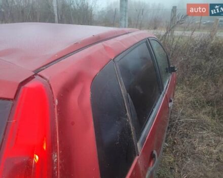 Красный Форд Фиеста, объемом двигателя 1.4 л и пробегом 175 тыс. км за 1750 $, фото 11 на Automoto.ua
