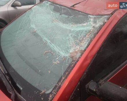 Красный Форд Фиеста, объемом двигателя 1.4 л и пробегом 175 тыс. км за 1750 $, фото 2 на Automoto.ua