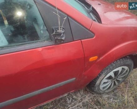 Красный Форд Фиеста, объемом двигателя 1.4 л и пробегом 175 тыс. км за 1750 $, фото 12 на Automoto.ua