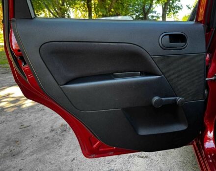 Червоний Форд Фієста, об'ємом двигуна 1.4 л та пробігом 183 тис. км за 3940 $, фото 20 на Automoto.ua