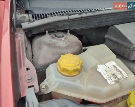 Красный Форд Фиеста, объемом двигателя 1.4 л и пробегом 170 тыс. км за 4100 $, фото 32 на Automoto.ua