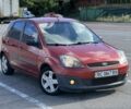 Красный Форд Фиеста, объемом двигателя 1.4 л и пробегом 149 тыс. км за 2992 $, фото 1 на Automoto.ua