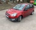 Красный Форд Фиеста, объемом двигателя 1.4 л и пробегом 146 тыс. км за 4100 $, фото 1 на Automoto.ua