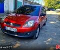 Красный Форд Фиеста, объемом двигателя 1.4 л и пробегом 247 тыс. км за 4158 $, фото 1 на Automoto.ua