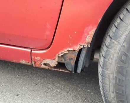 Червоний Форд Фієста, об'ємом двигуна 1.4 л та пробігом 149 тис. км за 3200 $, фото 16 на Automoto.ua