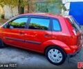 Красный Форд Фиеста, объемом двигателя 1.4 л и пробегом 247 тыс. км за 4158 $, фото 6 на Automoto.ua