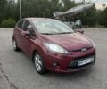 Красный Форд Фиеста, объемом двигателя 1.4 л и пробегом 110 тыс. км за 7499 $, фото 1 на Automoto.ua