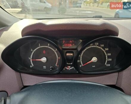 Красный Форд Фиеста, объемом двигателя 1.4 л и пробегом 136 тыс. км за 6300 $, фото 12 на Automoto.ua