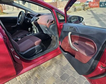 Красный Форд Фиеста, объемом двигателя 1.4 л и пробегом 136 тыс. км за 6300 $, фото 11 на Automoto.ua