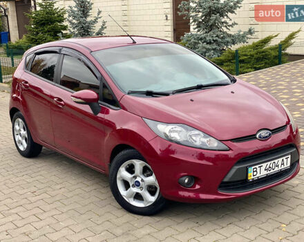 Красный Форд Фиеста, объемом двигателя 1.4 л и пробегом 65 тыс. км за 8300 $, фото 1 на Automoto.ua