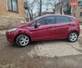 Красный Форд Фиеста, объемом двигателя 1.4 л и пробегом 160 тыс. км за 5800 $, фото 1 на Automoto.ua