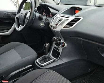 Червоний Форд Фієста, об'ємом двигуна 1.4 л та пробігом 156 тис. км за 7000 $, фото 4 на Automoto.ua