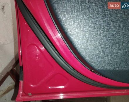 Червоний Форд Фієста, об'ємом двигуна 1.24 л та пробігом 62 тис. км за 6250 $, фото 5 на Automoto.ua