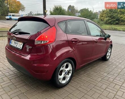 Красный Форд Фиеста, объемом двигателя 1.4 л и пробегом 168 тыс. км за 6700 $, фото 3 на Automoto.ua