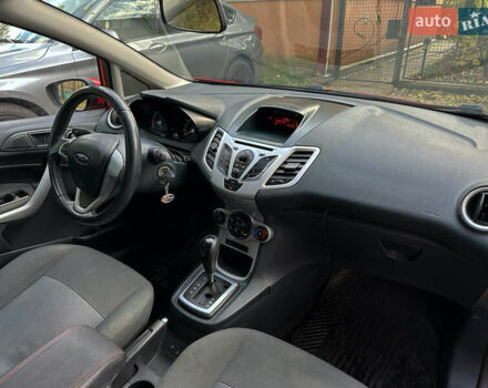 Форд Фиеста 2011 в Львове на Automoto.ua Красный Форд Фиеста, объемом двигателя 1.39 л и пробегом 118 тыс. км за 6800 $, фото 19 на Automoto.ua