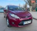 Червоний Форд Фієста, об'ємом двигуна 1.39 л та пробігом 127 тис. км за 7600 $, фото 1 на Automoto.ua