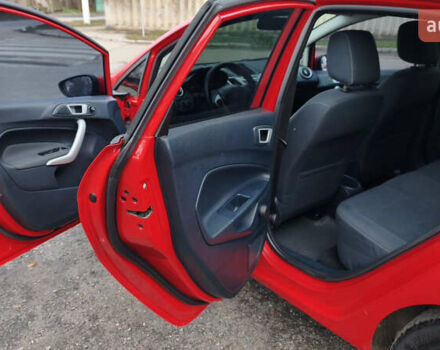 Красный Форд Фиеста, объемом двигателя 1.4 л и пробегом 193 тыс. км за 7500 $, фото 19 на Automoto.ua