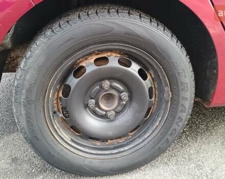 Красный Форд Фиеста, объемом двигателя 1.39 л и пробегом 118 тыс. км за 7000 $, фото 27 на Automoto.ua