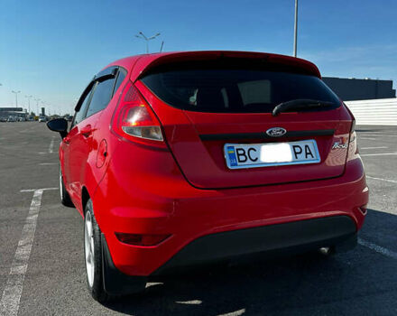 Красный Форд Фиеста, объемом двигателя 1.4 л и пробегом 200 тыс. км за 5900 $, фото 7 на Automoto.ua