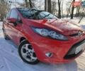 Червоний Форд Фієста, об'ємом двигуна 1.4 л та пробігом 197 тис. км за 7500 $, фото 1 на Automoto.ua