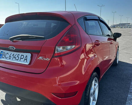 Красный Форд Фиеста, объемом двигателя 1.4 л и пробегом 200 тыс. км за 5900 $, фото 12 на Automoto.ua