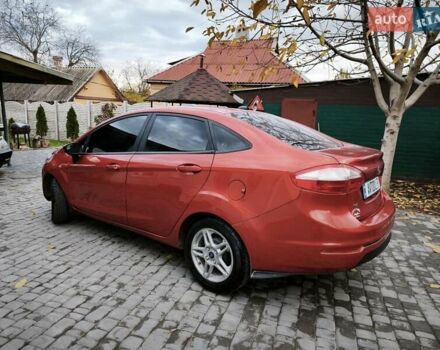 Красный Форд Фиеста, объемом двигателя 1.6 л и пробегом 113 тыс. км за 6900 $, фото 2 на Automoto.ua